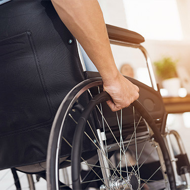 Man injured in a wheelchair